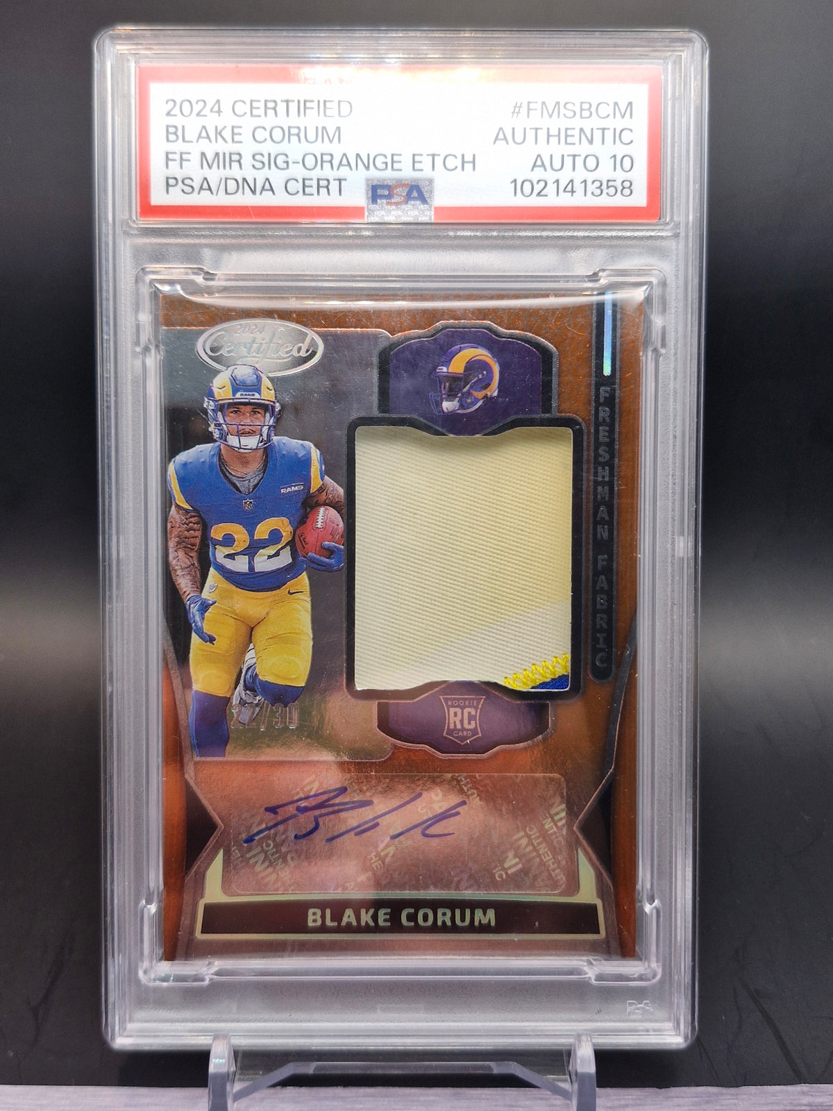2024 Panini Certified #FMS-BCM Blake Corum Freshman Fabric Auto Orange #/30