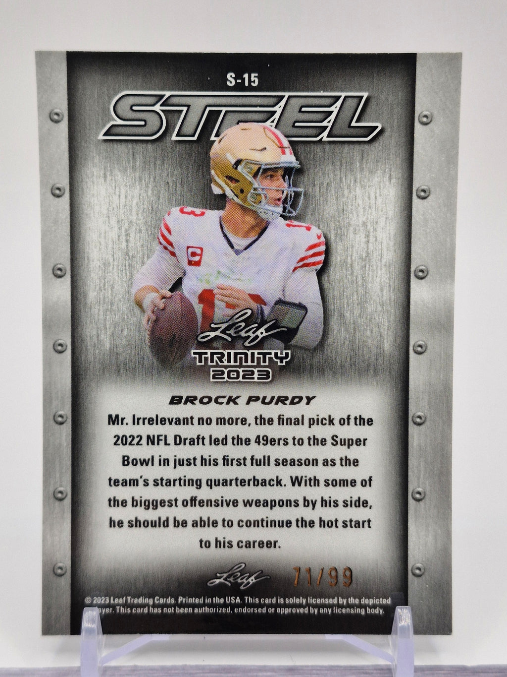 2023 Leaf Trinity (Mega Box) #S-15 Brock Purdy Steel Stars and Dots Blue #/99