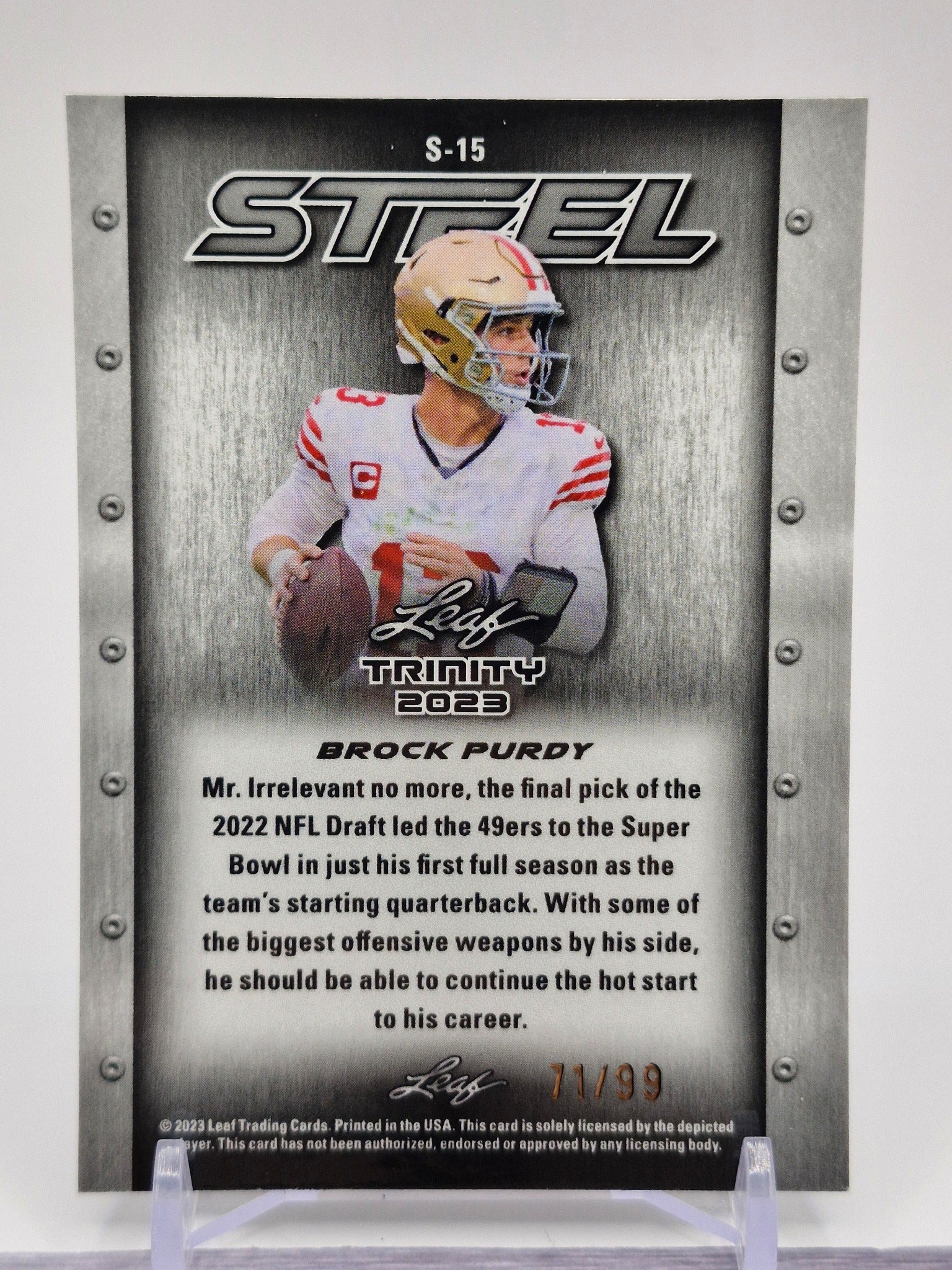 2023 Leaf Trinity (Mega Box) #S-15 Brock Purdy Steel Stars and Dots Blue #/99