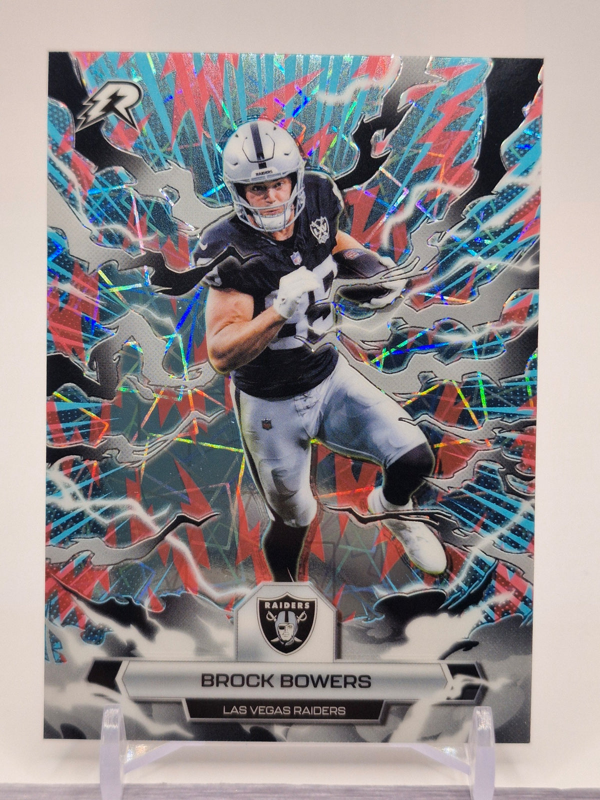 2025 Topps Resurgence #52 Brock Bowers Sky Blue & Pink Shock Refractor