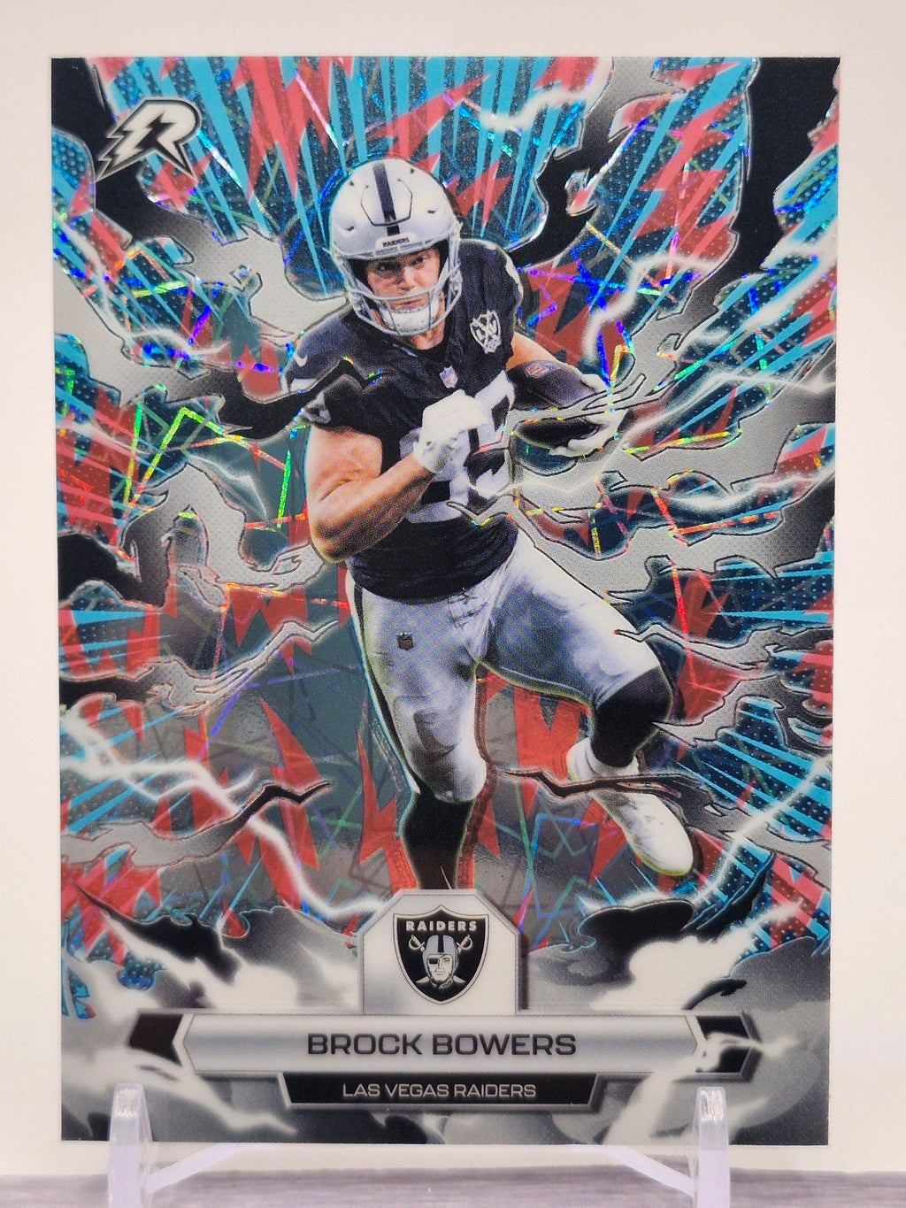 2025 Topps Resurgence #52 Brock Bowers Sky Blue & Pink Shock Refractor