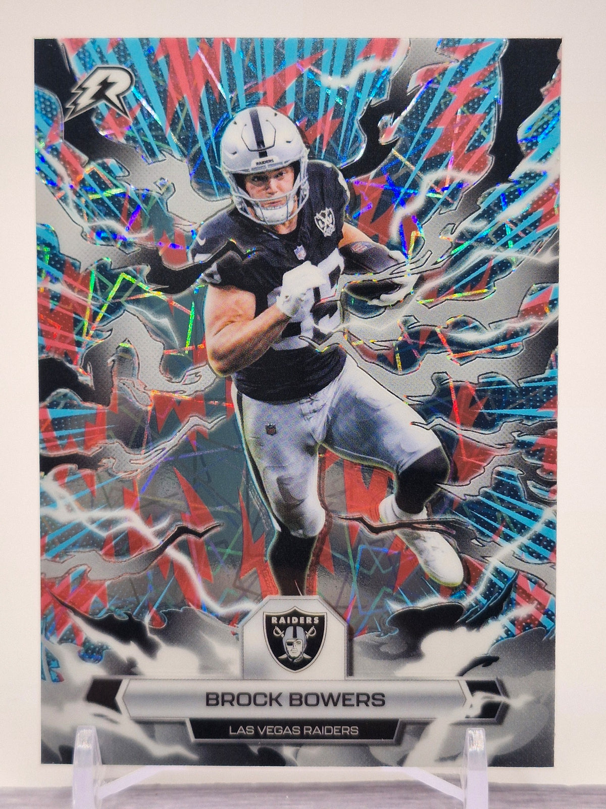 2025 Topps Resurgence #52 Brock Bowers Sky Blue & Pink Shock Refractor